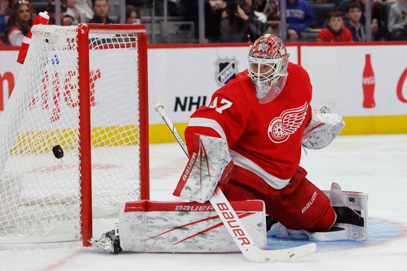 Oct 22, 2023; Detroit, Michigan, USA;  Detroit Red Wings goaltender James Reimer (47) makes the save in the third period against the Calgary Flames at Little Caesars Arena. Mandatory Credit: Rick Osentoski-USA TODAY Sports