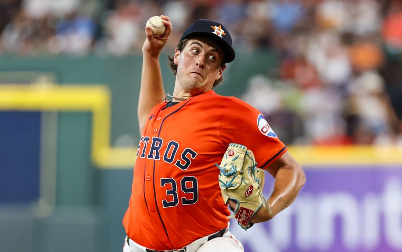 Jun 21, 2024; Houston, Texas, USA; Houston Astros starting pitcher Jake Bloss (39) pitches against the Baltimore Orioles in the second inning at Minute Maid Park. Mandatory Credit: Thomas Shea-USA TODAY Sports