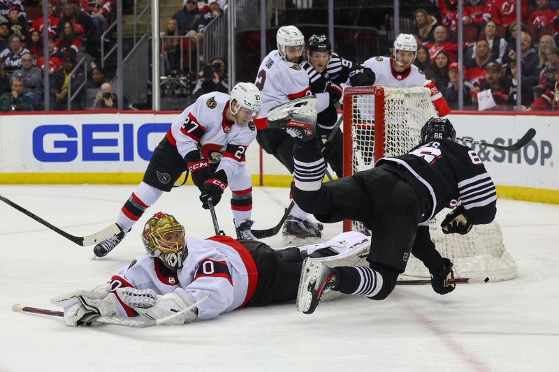 Mar 23, 2024; Newark, New Jersey, USA; Ottawa Senators goaltender Joonas Korpisalo (70) makes a save on New Jersey Devils center Jack Hughes (86) during the second period at Prudential Center. Mandatory Credit: Ed Mulholland-USA TODAY Sports