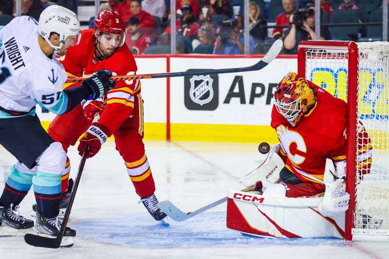 Oct 3, 2022; Calgary, Alberta, CAN; Calgary Flames goaltender Jacob Markstrom (25) makes a save against the Seattle Kraken during the second period at Scotiabank Saddledome. Mandatory Credit: Sergei Belski-USA TODAY Sports