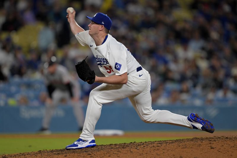 Apr 2, 2024; Los Angeles, California, USA;  Los Angeles Dodgers relief pitcher Evan Phillips (59) throws to the plate as he earns a save in the ninth inning against the San Francisco Giants at Dodger Stadium. Mandatory Credit: Jayne Kamin-Oncea-USA TODAY Sports