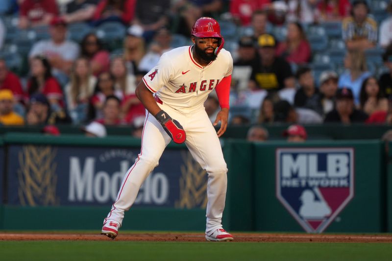 Jun 17, 2024; Anaheim, California, USA; Los Angeles Angels right fielder Jo Adell (7) takes a lead off first base in the third inning against the Milwaukee Brewers
 at Angel Stadium. Mandatory Credit: Kirby Lee-USA TODAY Sports