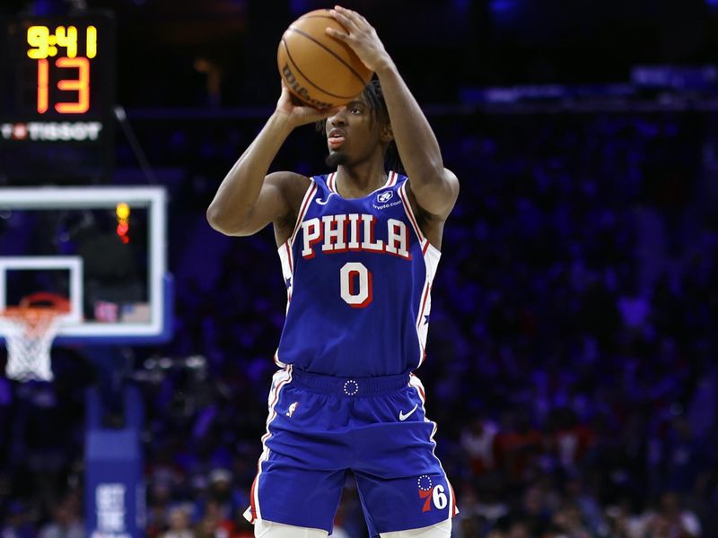 PHILADELPHIA, PENNSYLVANIA - APRIL 25: Tyrese Maxey #0 of the Philadelphia 76ers shoots during the third quarter against the New York Knicks during game three of the Eastern Conference First Round Playoffs at the Wells Fargo Center on April 25, 2024 in Philadelphia, Pennsylvania. NOTE TO USER: User expressly acknowledges and agrees that, by downloading and/or using this Photograph, user is consenting to the terms and conditions of the Getty Images License Agreement. (Photo by Tim Nwachukwu/Getty Images)