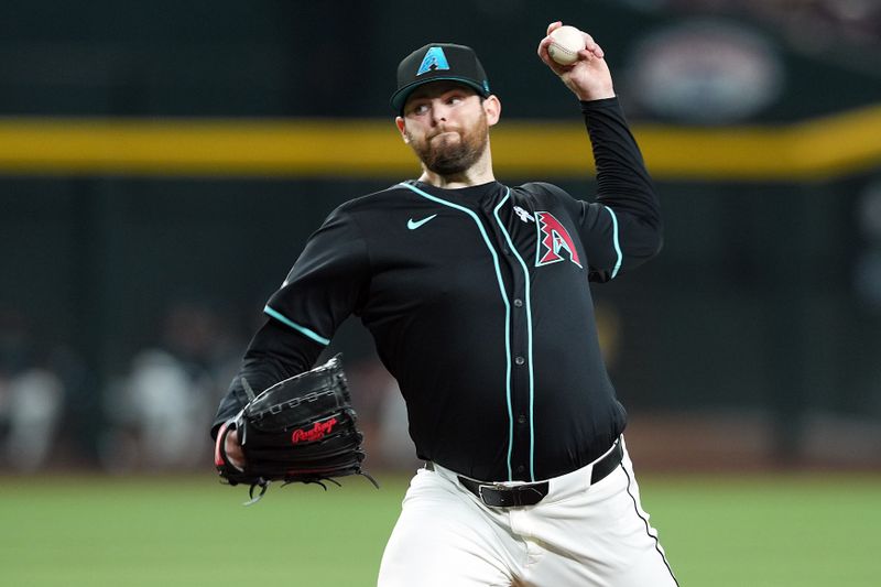 Jun 16, 2024; Phoenix, Arizona, USA; Arizona Diamondbacks pitcher Jordan Montgomery (52) pitches against the Chicago White Sox during the first inning at Chase Field. Mandatory Credit: Joe Camporeale-USA TODAY Sports