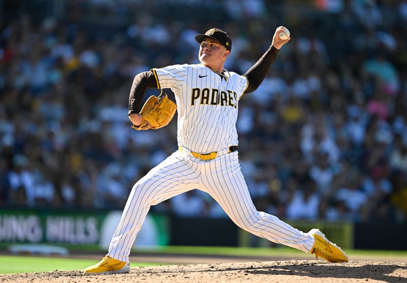 Sep 24, 2025; San Diego, California, USA; San Diego Padres relief pitcher Adrian Morejon (50) delivers during the seventh inning against the Milwaukee Brewers at Petco Park. Mandatory Credit: Denis Poroy-Imagn Images