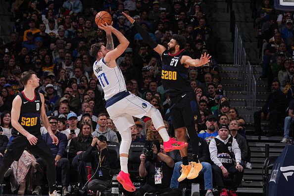 DENVER, CO - DECEMBER 18: Luka Doncic #77 of the Dallas Mavericks shoots the ball during the game against the Denver Nuggets on December 18, 2023 at the Ball Arena in Denver, Colorado. NOTE TO USER: User expressly acknowledges and agrees that, by downloading and/or using this Photograph, user is consenting to the terms and conditions of the Getty Images License Agreement. Mandatory Copyright Notice: Copyright 2023 NBAE (Photo by Bart Young/NBAE via Getty Images)