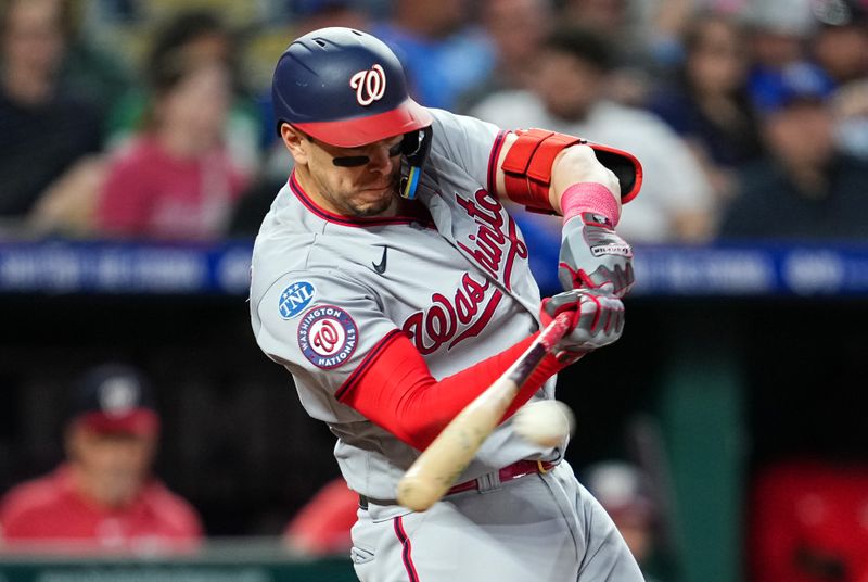 May 26, 2023; Kansas City, Missouri, USA; Washington Nationals designated hitter Joey Meneses (45) hits an RBI single during the sixth inning against the Kansas City Royals at Kauffman Stadium. Mandatory Credit: Jay Biggerstaff-USA TODAY Sports