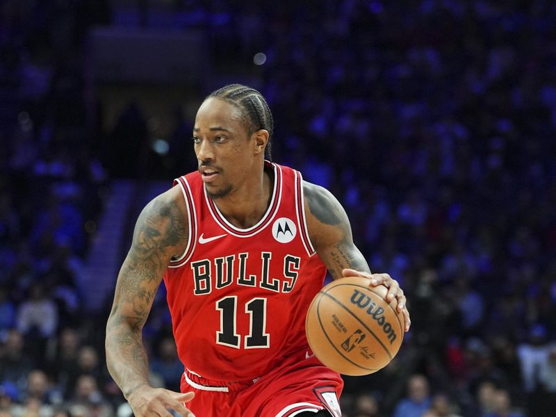 PHILADELPHIA, PENNSYLVANIA - JANUARY 2: DeMar DeRozan #11 of the Chicago Bulls dribbles the ball against the Philadelphia 76ers at the Wells Fargo Center on January 2, 2024 in Philadelphia, Pennsylvania. The 76ers defeated the Bulls 110-97. NOTE TO USER: User expressly acknowledges and agrees that, by downloading and or using this photograph, User is consenting to the terms and conditions of the Getty Images License Agreement. (Photo by Mitchell Leff/Getty Images)