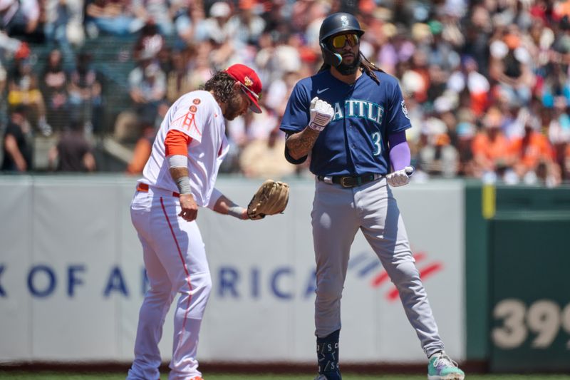 Jul 4, 2023; San Francisco, California, USA; Seattle Mariners infielder J.P. Crawford (3) gestures toward his dugout after hitting a double against the San Francisco Giants during the first inning at Oracle Park. Mandatory Credit: Robert Edwards-USA TODAY Sports