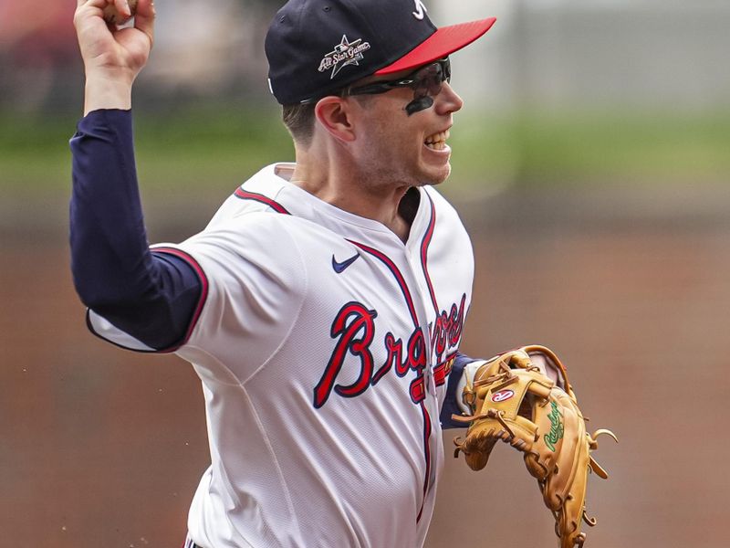 Apr 23, 2025; Cumberland, Georgia, USA; Atlanta Braves shortstop Nick Allen (2) throws after fielding a ground ball against the St. Louis Cardinals during the first inning at Truist Park. Mandatory Credit: Dale Zanine-Imagn Images