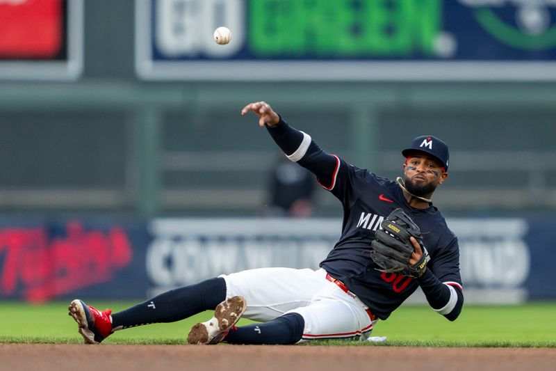 Apr 22, 2024; Minneapolis, Minnesota, USA; Minnesota Twins shortstop Willi Castro (50) throws the ball to first base after fielding a ground ball against the Chicago White Sox in the fourth inning at Target Field. Mandatory Credit: Jesse Johnson-USA TODAY Sports