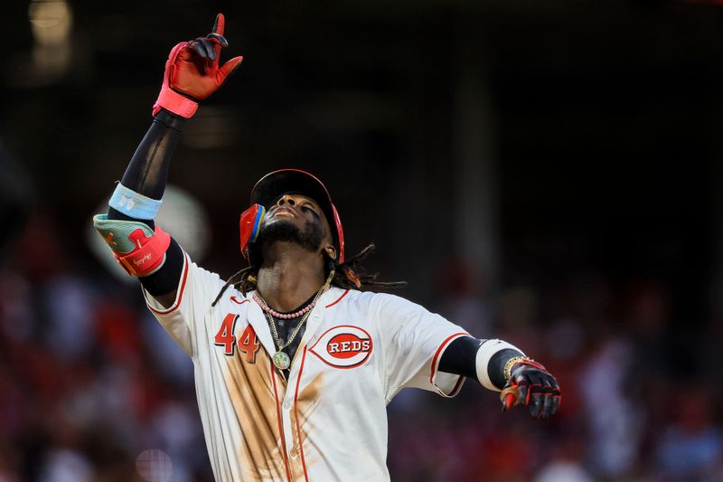 Jun 24, 2024; Cincinnati, Ohio, USA; Cincinnati Reds shortstop Elly De La Cruz (44) reacts after hitting a two-run home run in the sixth inning against the Pittsburgh Pirates at Great American Ball Park. Mandatory Credit: Katie Stratman-USA TODAY Sports