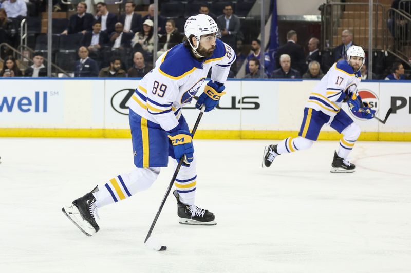 Jan 8, 2026; New York, New York, USA;  Buffalo Sabres right wing Alex Tuch (89) attempts a shot on goal in the second period against the New York Rangers at Madison Square Garden. Mandatory Credit: Wendell Cruz-Imagn Images