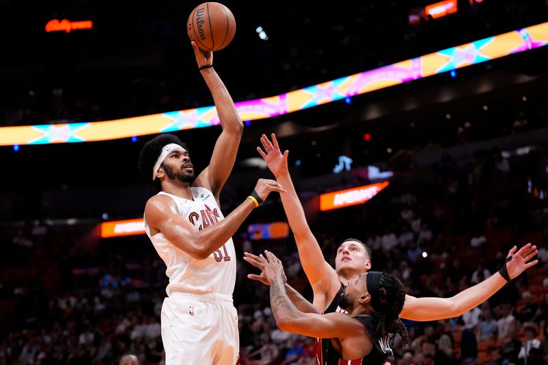 MIAMI, FLORIDA - MARCH 24: Jarrett Allen #31 of the Cleveland Cavaliers goes up for a shot against Nikola Jovic #5 of the Miami Heat during the first quarter at Kaseya Center on March 24, 2024 in Miami, Florida. NOTE TO USER: User expressly acknowledges and agrees that, by downloading and or using this photograph, User is consenting to the terms and conditions of the Getty Images License Agreement. (Photo by Rich Storry/Getty Images)