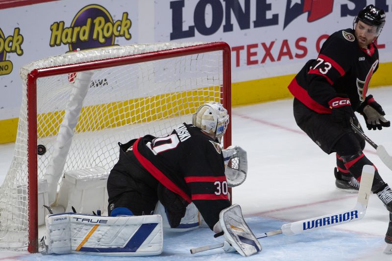 Sep 26, 2024; Ottawa, Ontario, CAN; Buffalo Sabres center Noah Ostlund (36 - not pictured) scores against Ottawa Senators goalie Dustin Tokarski (30) in overtime at the Canadian Tire Centre. Mandatory Credit: Marc DesRosiers-Imagn Images