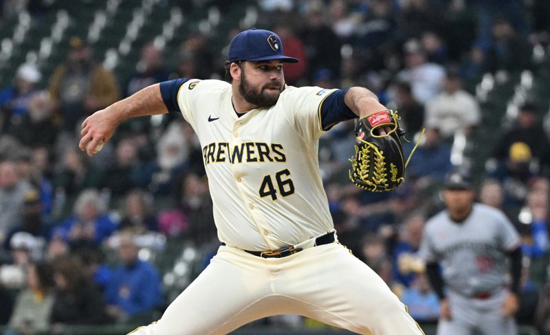 Apr 3, 2024; Milwaukee, Wisconsin, USA; Milwaukee Brewers relief pitcher Bryse Wilson (46) delivers a pitch against the Minnesota Twins in the seventh inning at American Family Field. Mandatory Credit: Michael McLoone-USA TODAY Sports