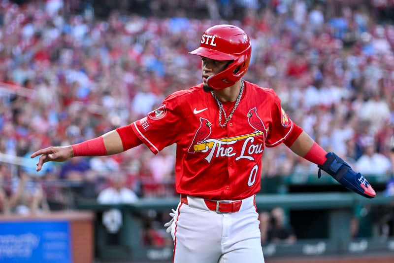 Jun 7, 2024; St. Louis, Missouri, USA;  St. Louis Cardinals shortstop Masyn Winn (0) reacts after he scored against the Colorado Rockies during the first inning at Busch Stadium. Mandatory Credit: Jeff Curry-USA TODAY Sports