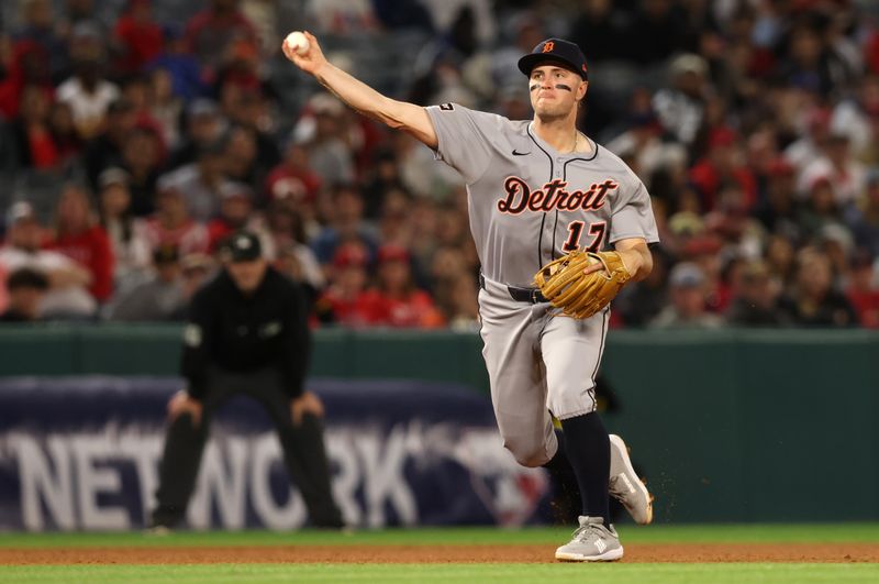 May 2, 2025; Anaheim, California, USA; Detroit Tigers third baseman Jace Jung (17) throws to first for an out during the eighth inning against the Los Angeles Angels at Angel Stadium. Mandatory Credit: Jason Parkhurst-Imagn Images