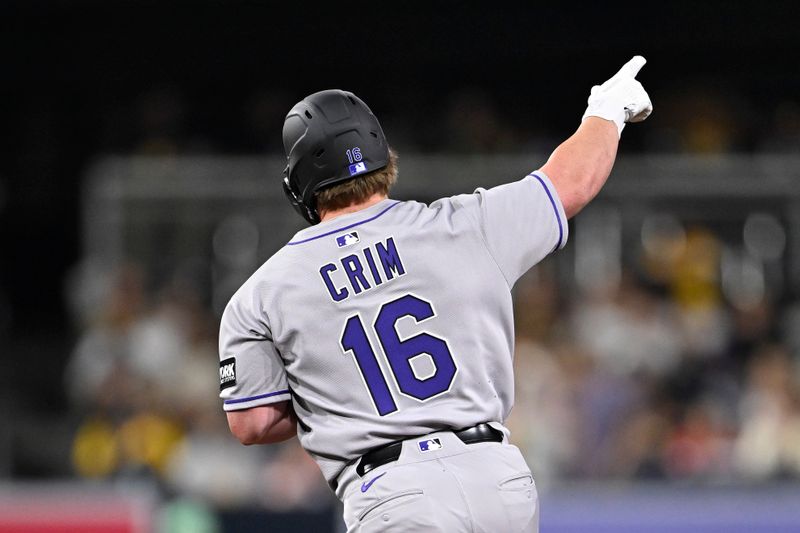 Sep 12, 2025; San Diego, California, USA; Colorado Rockies first baseman Blaine Crim (16) celebrates after hitting a three-run home run during the fourth inning against the San Diego Padres at Petco Park. Mandatory Credit: Denis Poroy-Imagn Images