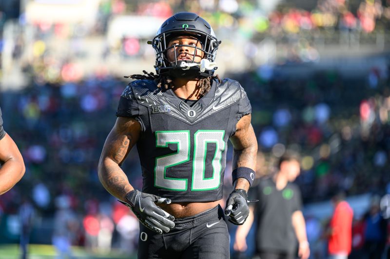 Oct 12, 2024; Eugene, Oregon, USA; Oregon Ducks running back Jordan James (20) warms up before the game against the Ohio State Buckeyes at Autzen Stadium. Mandatory Credit: Craig Strobeck-Imagn Images