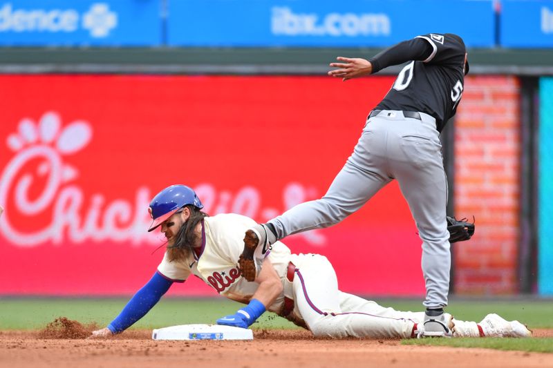 Apr 21, 2024; Philadelphia, Pennsylvania, USA; Philadelphia Phillies outfielder Brandon Marsh (16) slides safely into second base against the Chicago White Sox during the first inning at Citizens Bank Park. Mandatory Credit: Eric Hartline-USA TODAY Sports