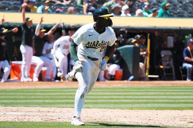 May 23, 2024; Oakland, California, USA; Oakland Athletics left fielder Daz Cameron (28) runs after hitting a home run against the Colorado Rockies during the ninth inning at Oakland-Alameda County Coliseum. Mandatory Credit: Kelley L Cox-USA TODAY Sports