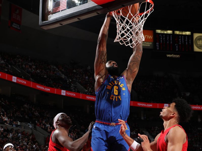 PORTLAND, OR - MARCH 23: DeAndre Jordan #6 of the Denver Nuggets dunks the ball during the game against the Portland Trail Blazers on March 23, 2024 at the Moda Center Arena in Portland, Oregon. NOTE TO USER: User expressly acknowledges and agrees that, by downloading and or using this photograph, user is consenting to the terms and conditions of the Getty Images License Agreement. Mandatory Copyright Notice: Copyright 2024 NBAE (Photo by Cameron Browne/NBAE via Getty Images)