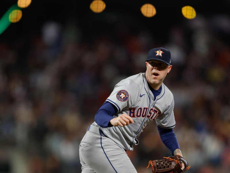 Jun 11, 2024; San Francisco, California, USA; Houston Astros pitcher Ryan Pressly (55) throws a pitch during the ninth inning against the San Francisco Giants at Oracle Park. Mandatory Credit: Sergio Estrada-USA TODAY Sports