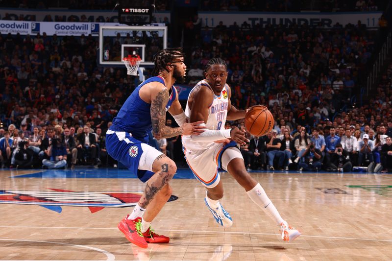 OKLAHOMA CITY, OK - FEBRUARY 22: Chet Holmgren #7 of the Oklahoma City Thunder handles the ball during the game against the LA Clippers on February 22SF, 2024 at Paycom Arena in Oklahoma City, Oklahoma. NOTE TO USER: User expressly acknowledges and agrees that, by downloading and or using this photograph, User is consenting to the terms and conditions of the Getty Images License Agreement. Mandatory Copyright Notice: Copyright 2024 NBAE (Photo by Zach Beeker/NBAE via Getty Images)