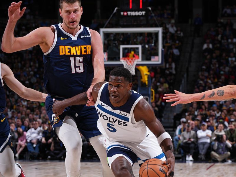 DENVER, CO - APRIL 10: Anthony Edwards #5 of the Minnesota Timberwolves dribbles the ball during the game against the Denver Nuggets on April 10, 2024 at the Ball Arena in Denver, Colorado. NOTE TO USER: User expressly acknowledges and agrees that, by downloading and/or using this Photograph, user is consenting to the terms and conditions of the Getty Images License Agreement. Mandatory Copyright Notice: Copyright 2024 NBAE (Photo by Garrett Ellwood/NBAE via Getty Images)