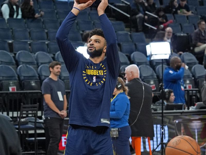 MINNEAPOLIS, MN - NOVEMBER 1:  Jamal Murray #27 of the Denver Nuggets warms up before the game against the Minnesota Timberwolves on November 1, 2024 at Target Center in Minneapolis, Minnesota. NOTE TO USER: User expressly acknowledges and agrees that, by downloading and or using this Photograph, user is consenting to the terms and conditions of the Getty Images License Agreement. Mandatory Copyright Notice: Copyright 2024 NBAE (Photo by Jordan Johnson/NBAE via Getty Images)