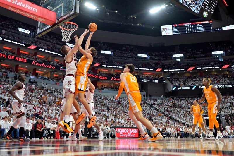 Nov 9, 2024; Louisville, Kentucky, USA;  Tennessee Volunteers forward Cade Phillips (12) shoots against Louisville Cardinals forward Noah Waterman (93) during the first half at KFC Yum! Center. Mandatory Credit: Jamie Rhodes-Imagn Images