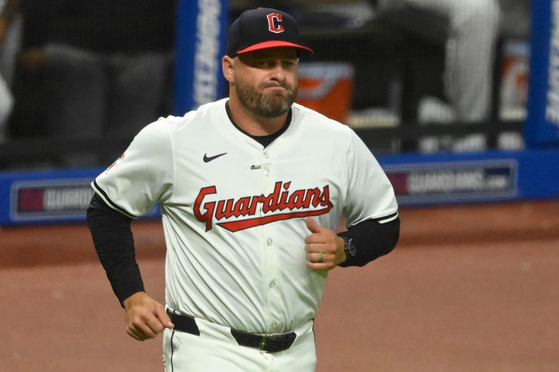 Aug 14, 2024; Cleveland, Ohio, USA; Cleveland Guardians manager Stephen Vogt (12) runs on the field in the eighth inning against the Chicago Cubs at Progressive Field. Mandatory Credit: David Richard-USA TODAY Sports