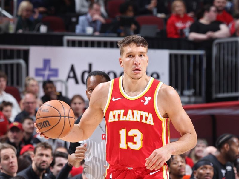 CHICAGO, IL - APRIL 1: Bogdan Bogdanovic #13 of the Atlanta Hawks dribbles the ball during the game against the Chicago Bulls on April 1, 2024 at United Center in Chicago, Illinois. NOTE TO USER: User expressly acknowledges and agrees that, by downloading and or using this photograph, User is consenting to the terms and conditions of the Getty Images License Agreement. Mandatory Copyright Notice: Copyright 2024 NBAE (Photo by Jeff Haynes/NBAE via Getty Images)