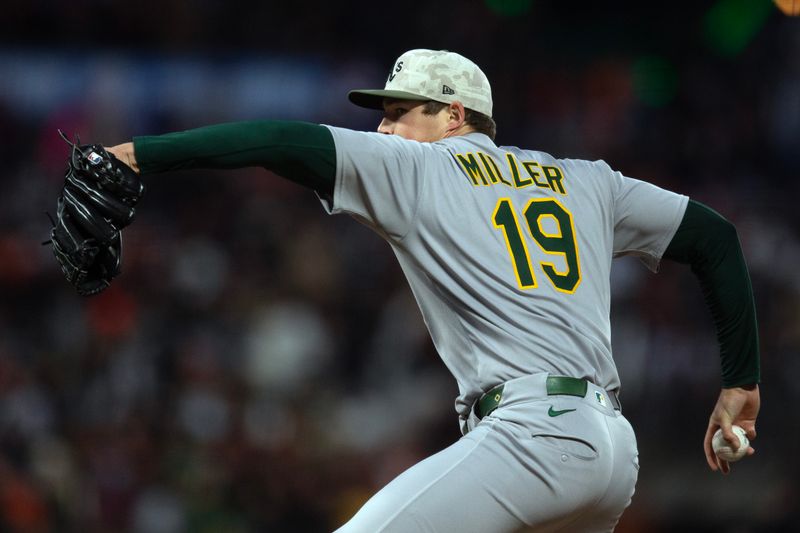 May 17, 2025; San Francisco, California, USA; Athletics pitcher Mason Miller (19) delivers a pitch against the San Francisco Giants during the tenth inning at Oracle Park. Mandatory Credit: D. Ross Cameron-Imagn Images