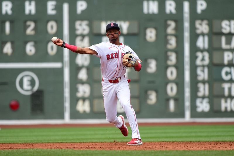 Jul 14, 2024; Boston, Massachusetts, USA;  Boston Red Sox shortstop Ceddanne Rafaela (43) throws to first for an out during the third inning against the Kansas City Royals at Fenway Park. Mandatory Credit: Bob DeChiara-USA TODAY Sports