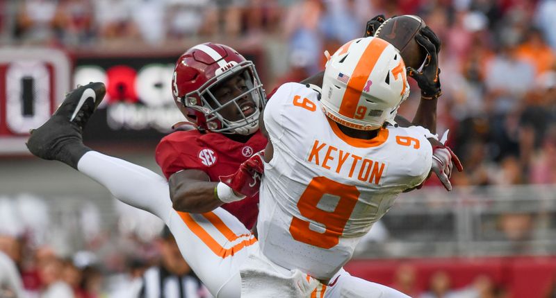 Oct 21, 2023; Tuscaloosa, Alabama, USA;  Tennessee Volunteers wide receiver Ramel Keyton (9) catches a pass over Alabama Crimson Tide defensive back Terrion Arnold (3) for a long first down at Bryant-Denny Stadium. Mandatory Credit: Gary Cosby Jr.-USA TODAY Sports