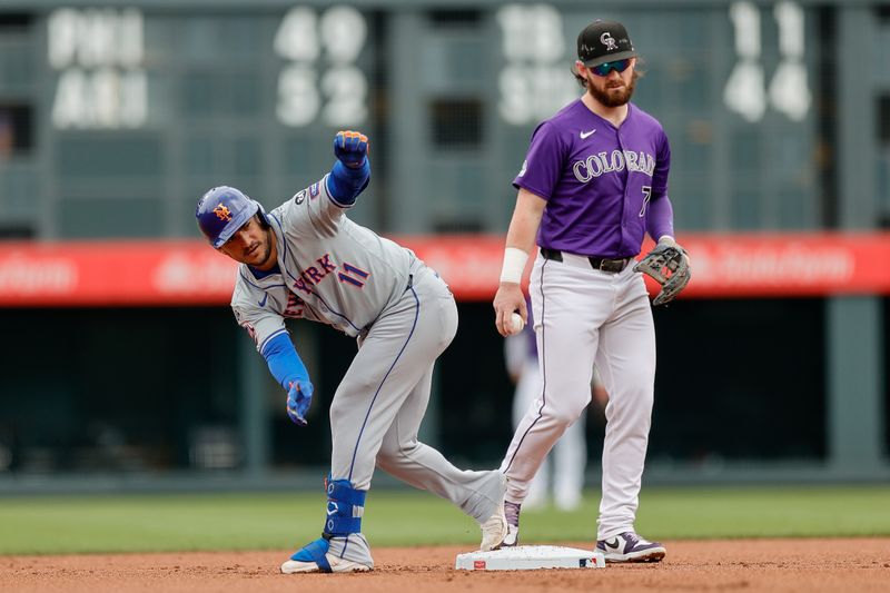 Aug 8, 2024; Denver, Colorado, USA; New York Mets second baseman Jose Iglesias (11) reacts from second on an RBI double in the first inning against the Colorado Rockies at Coors Field. Mandatory Credit: Isaiah J. Downing-USA TODAY Sports