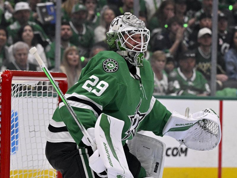 May 11, 2025; Dallas, Texas, USA; Dallas Stars goaltender Jake Oettinger (29) faces the Winnipeg Jets attack during the first period in game three of the second round of the 2025 Stanley Cup Playoffs at American Airlines Center. Mandatory Credit: Jerome Miron-Imagn Images