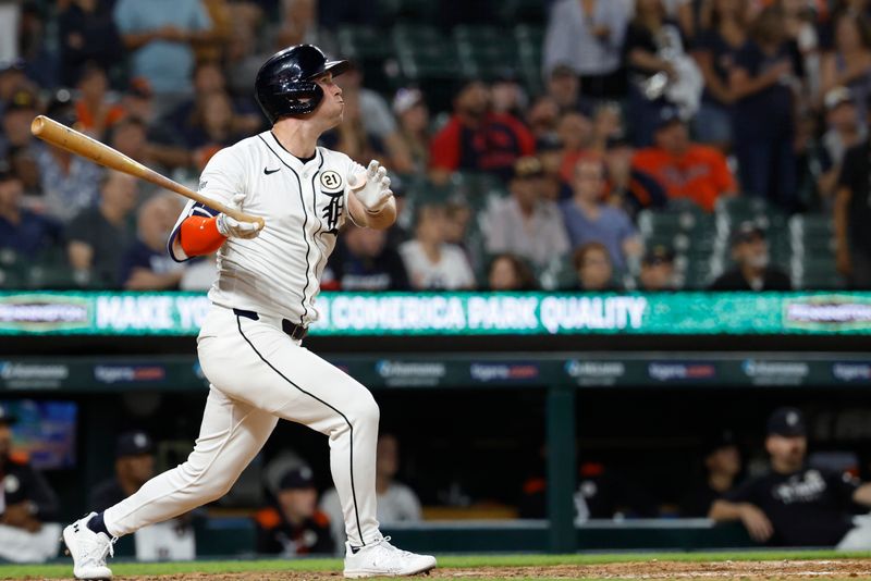 Sep 16, 2025; Detroit, Michigan, USA; Detroit Tigers outfielder Kerry Carpenter (30) hits a home run in the ninth inning against the Cleveland Guardians at Comerica Park. Mandatory Credit: Rick Osentoski-Imagn Images