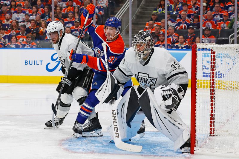 Apr 22, 2024; Edmonton, Alberta, CAN; Edmonton Oilers forward Ryan Nugent-Hopkins (93) battles with Los Angeles Kings forward Anze Kopitar (11) in front of goaltender Cam Talbot (39) during the third period in game one of the first round of the 2024 Stanley Cup Playoffs at Rogers Place. Mandatory Credit: Perry Nelson-USA TODAY Sports