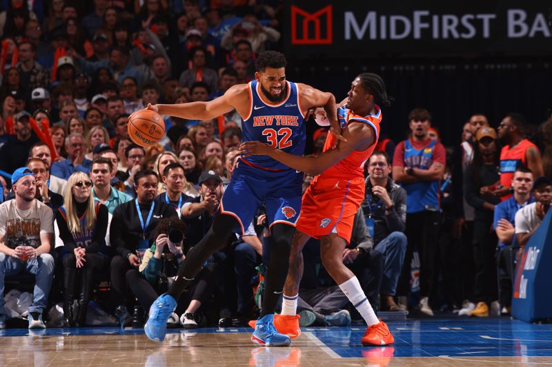 OKLAHOMA CITY, OK - JANUARY 3:  Karl-Anthony Towns #32 of the New York Knicks dribbles the ball during the game against the Oklahoma City Thunder on January 3, 2025 at Paycom Center in Oklahoma City, Oklahoma. NOTE TO USER: User expressly acknowledges and agrees that, by downloading and or using this photograph, User is consenting to the terms and conditions of the Getty Images License Agreement. Mandatory Copyright Notice: Copyright 2025 NBAE (Photo by Zach Beeker/NBAE via Getty Images)