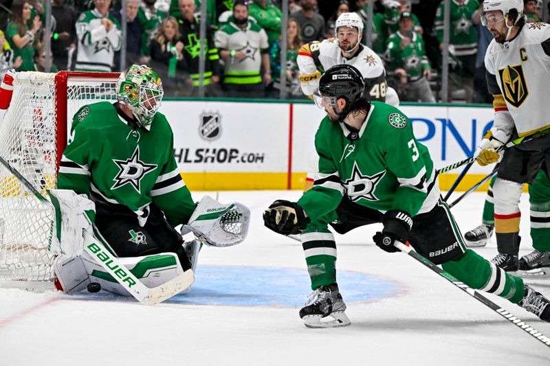 May 5, 2024; Dallas, Texas, USA; Dallas Stars goaltender Jake Oettinger (29) and defenseman Chris Tanev (3) stop a shot as Vegas Golden Knights center Tomas Hertl (48) and right wing Mark Stone (61) look for the rebound during the third period in game seven of the first round of the 2024 Stanley Cup Playoffs at American Airlines Center. Mandatory Credit: Jerome Miron-USA TODAY Sports