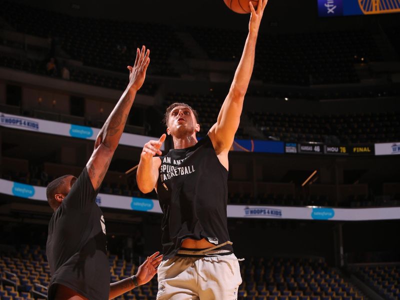 SAN FRANCISCO, CA - MARCH 9: Zach Collins #23 of the San Antonio Spurs warms up before the game against the Golden State Warriors on March 9, 2024 at Chase Center in San Francisco, California. NOTE TO USER: User expressly acknowledges and agrees that, by downloading and or using this photograph, user is consenting to the terms and conditions of Getty Images License Agreement. Mandatory Copyright Notice: Copyright 2024 NBAE (Photo by Jed Jacobsohn/NBAE via Getty Images)