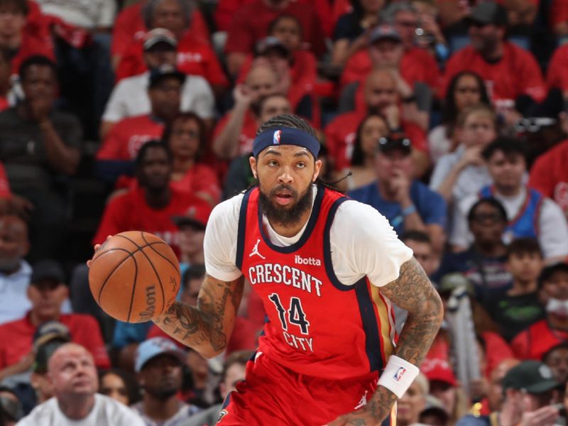 NEW ORLEANS, LA - APRIL 27: Brandon Ingram #14 of the New Orleans Pelicans brings the ball up court during the game against the Oklahoma City Thunder during Round 1 Game 3 of the 2024 NBA Playoffs on April 27, 2024 at the Smoothie King Center in New Orleans, Louisiana. NOTE TO USER: User expressly acknowledges and agrees that, by downloading and or using this Photograph, user is consenting to the terms and conditions of the Getty Images License Agreement. Mandatory Copyright Notice: Copyright 2024 NBAE (Photo by Layne Murdoch Jr./NBAE via Getty Images)