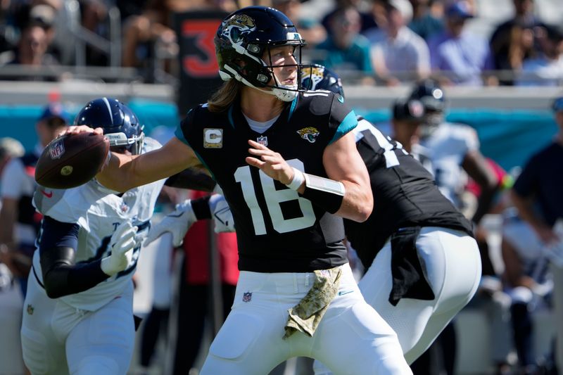 Jacksonville Jaguars quarterback Trevor Lawrence (16) looks to throw a pass during the first half of an NFL football game against the Tennessee Titans, Sunday, Nov. 19, 2023, in Jacksonville, Fla. (AP Photo/John Raoux)