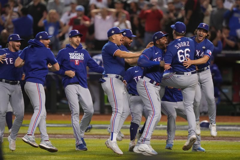 Nov 1, 2023; Phoenix, AZ, USA; The Texas Rangers storm the field after defeating the Arizona Diamondbacks to win the World Series in game five of the 2023 World Series at Chase Field. Mandatory Credit: Joe Camporeale-USA TODAY Sports