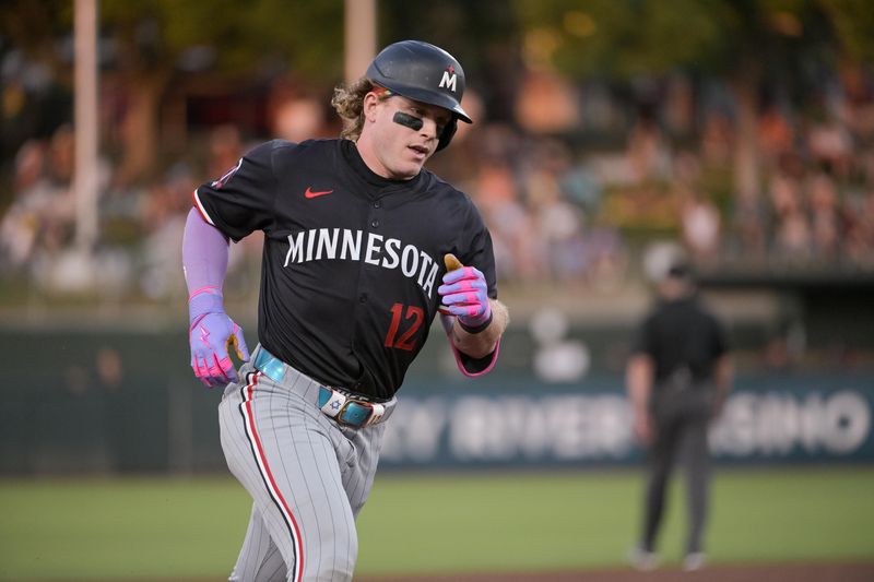 Jun 4, 2025; West Sacramento, California, USA; Minnesota Twins outfielder Harrison Bader (12) rounds the bases after hitting a home run against the Athletics during the fifth inning at Sutter Health Park. Mandatory Credit: Ed Szczepanski-Imagn Images