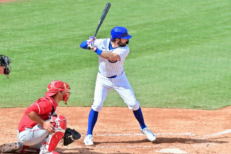 Feb 27, 2024; Mesa, Arizona, USA;  Chicago Cubs shortstop Dansby Swanson (7) at bat in the fourth inning against the Cincinnati Reds during a spring training game at Sloan Park. Mandatory Credit: Matt Kartozian-USA TODAY Sports