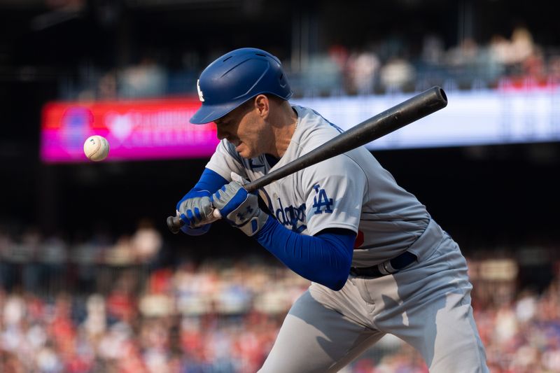 Jun 10, 2023; Philadelphia, Pennsylvania, USA; Los Angeles Dodgers first baseman Freddie Freeman (5) reacts after being hit in the leg by a pitch during the seventh inning against the Philadelphia Phillies at Citizens Bank Park. Mandatory Credit: Bill Streicher-USA TODAY Sports